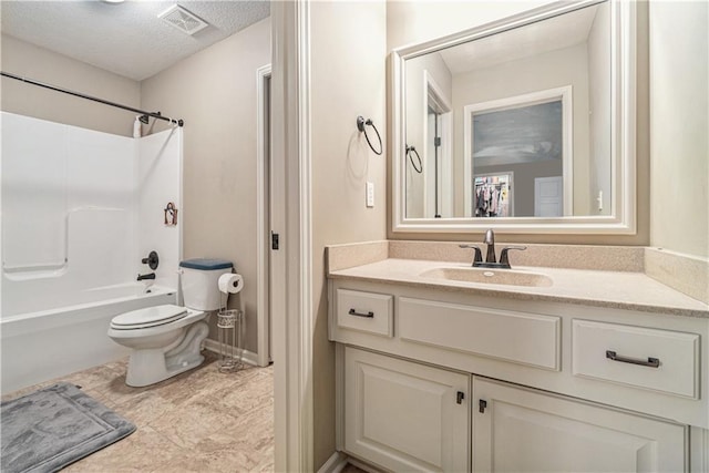 full bathroom with vanity, toilet, shower / bathing tub combination, and a textured ceiling