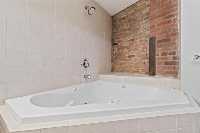 bathroom with a relaxing tiled tub