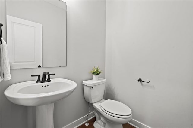 bathroom featuring toilet