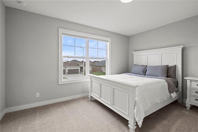 bedroom featuring carpet