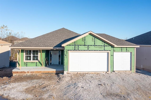 single story home with a garage