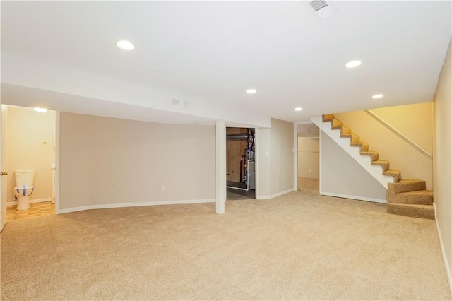 basement with light colored carpet