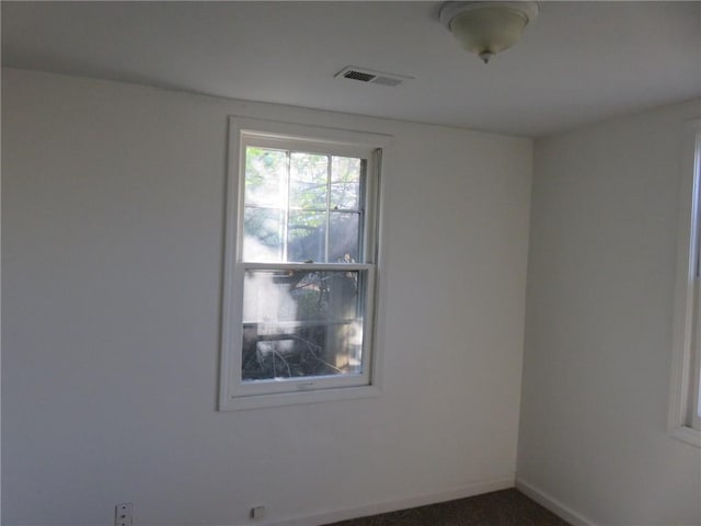 view of carpeted spare room