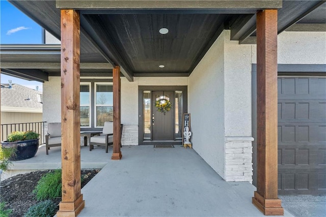 property entrance with covered porch