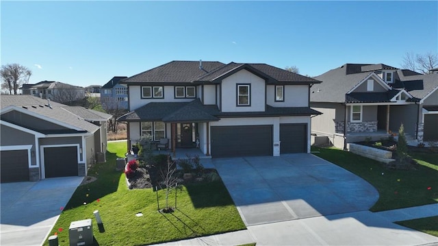 view of front facade with a garage and a front lawn