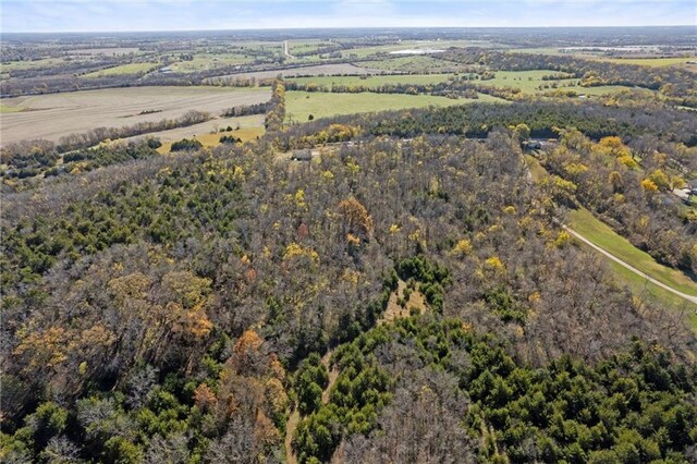 27977 W 311th St, Paola, KS 66071 - aerial overview of property's location with a forest