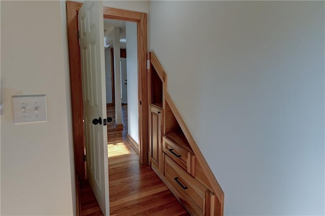 corridor with light wood-style floors