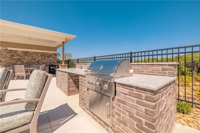 view of patio / terrace with a grill and area for grilling