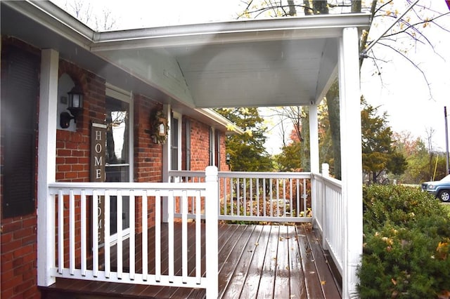 wooden deck featuring a porch