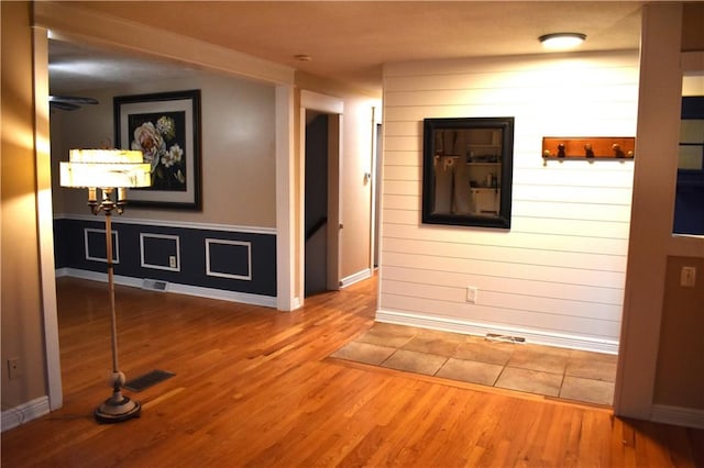 hallway featuring hardwood / wood-style floors