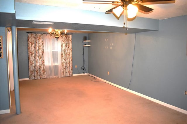 empty room featuring carpet flooring and ceiling fan