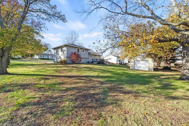 view of yard with a storage shed