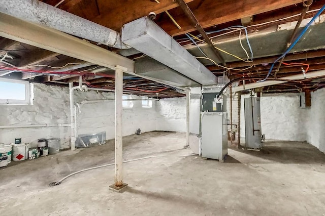 basement with heating unit and water heater