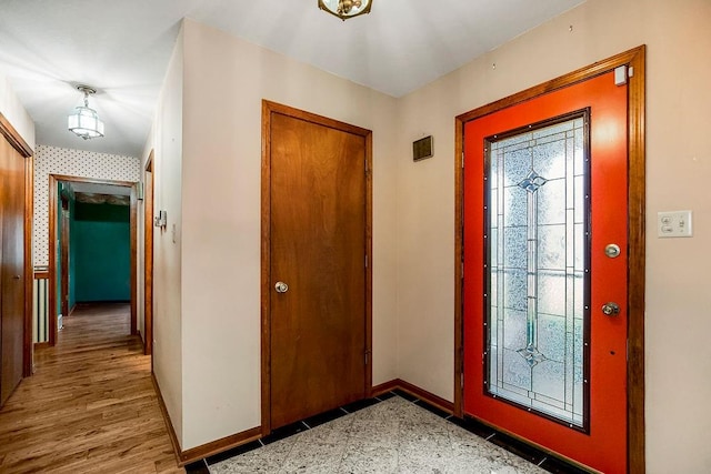 foyer featuring wood-type flooring