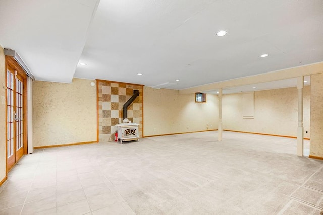 basement featuring a wood stove