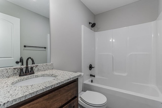 full bathroom featuring vanity, shower / bathtub combination, and toilet