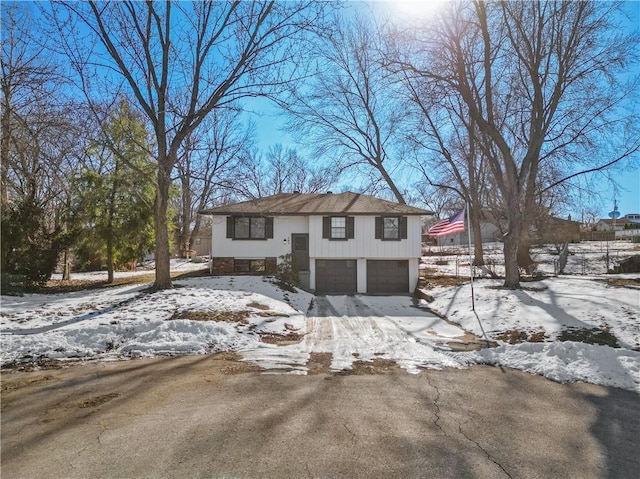 view of front of property with a garage