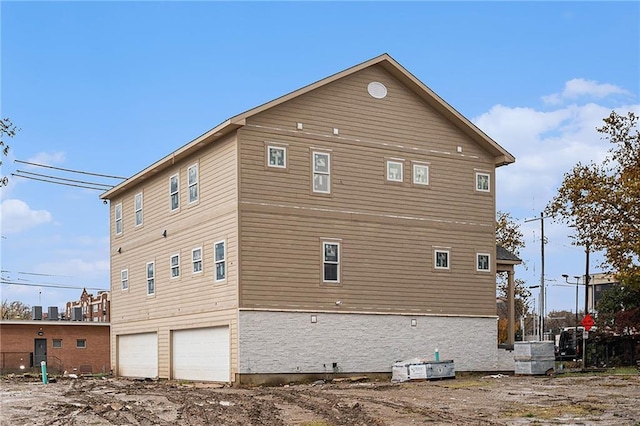 view of home's exterior featuring a garage