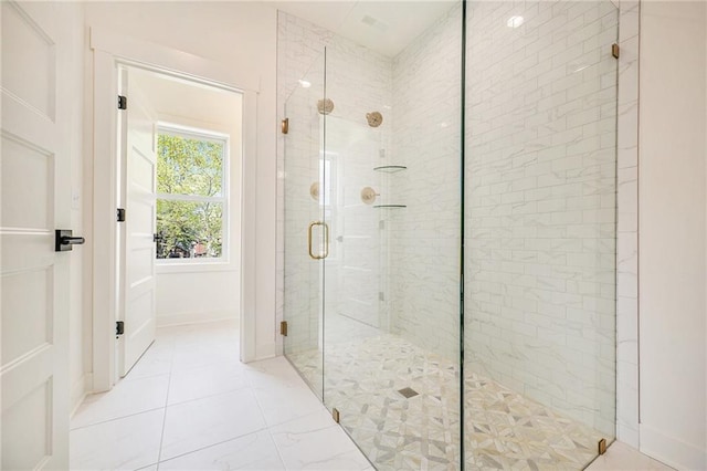 bathroom featuring a shower stall