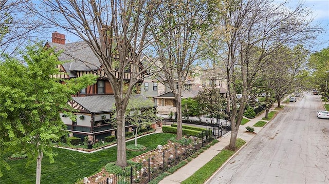 exterior space featuring sidewalks and curbs