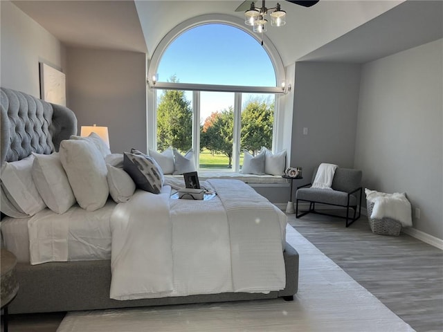 bedroom with hardwood / wood-style floors