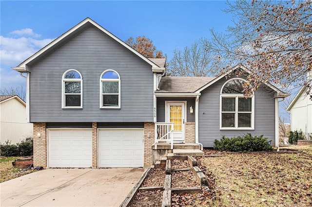 split level home with a garage