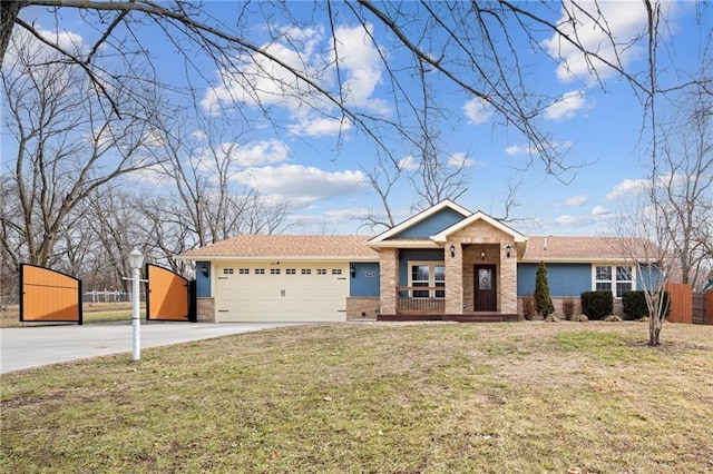 view of front of property with a garage and a front yard