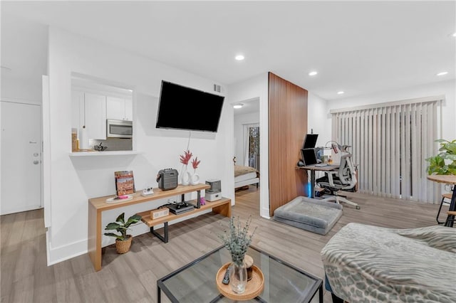 living room featuring light hardwood / wood-style flooring