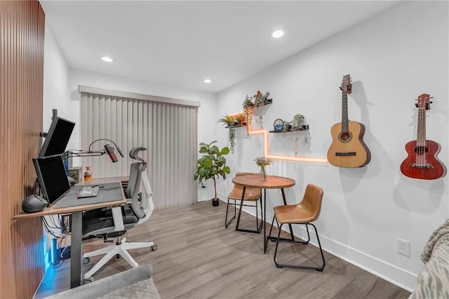 office with light wood-type flooring