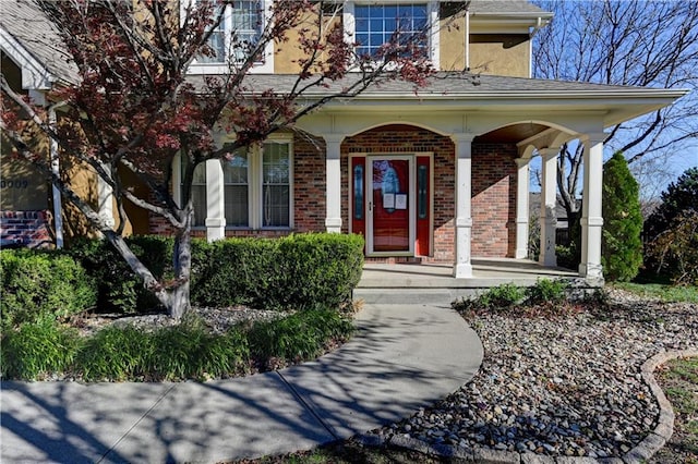 entrance to property with a porch