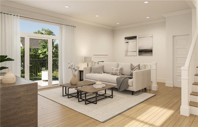 living room with a wealth of natural light, light hardwood / wood-style flooring, and crown molding