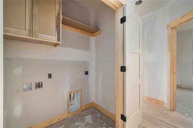 laundry area with electric dryer hookup, light hardwood / wood-style floors, and hookup for a washing machine