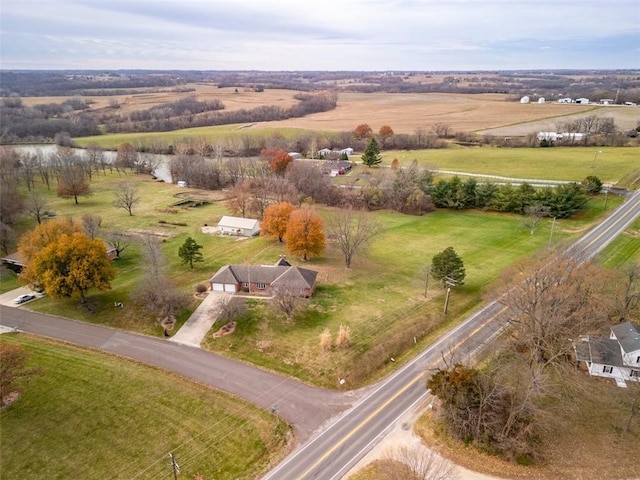 birds eye view of property featuring a rural view