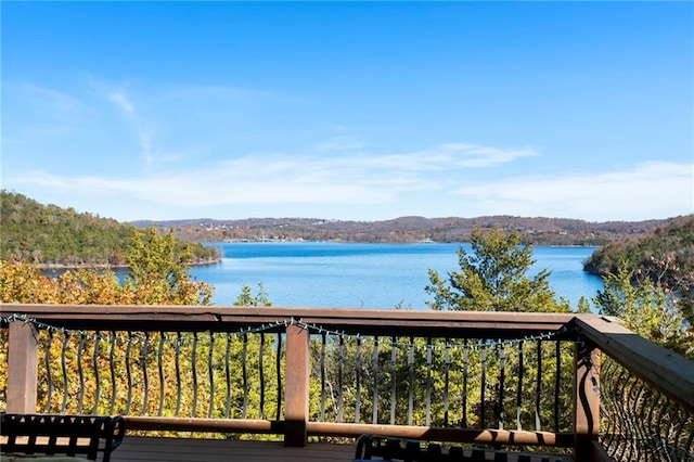 deck featuring a water view