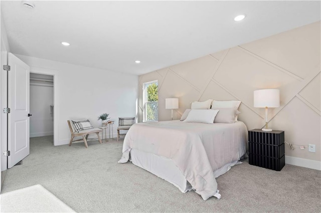 bedroom with recessed lighting, baseboards, and carpet