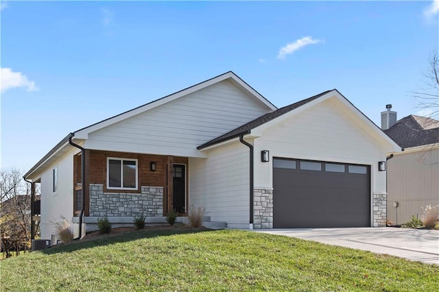 ranch-style home featuring a front lawn, stone siding, concrete driveway, an attached garage, and central AC unit