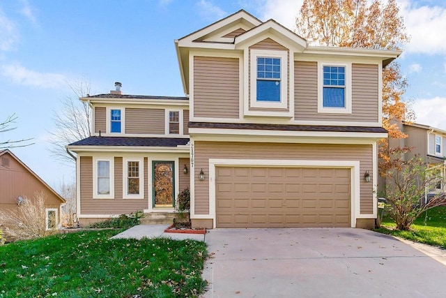 view of front property with a garage