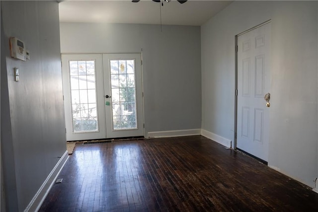 doorway to outside featuring dark hardwood / wood-style flooring, ceiling fan, and french doors