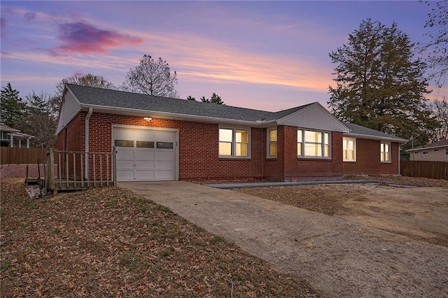 view of front of property with a garage