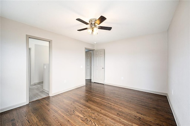 unfurnished bedroom featuring dark hardwood / wood-style floors and ceiling fan