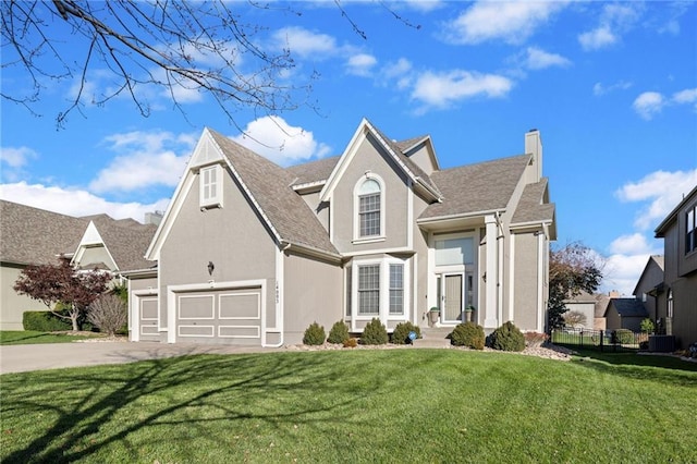 front facade with a garage and a front yard