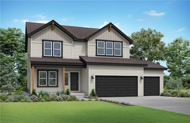 view of front facade with a garage and a front yard