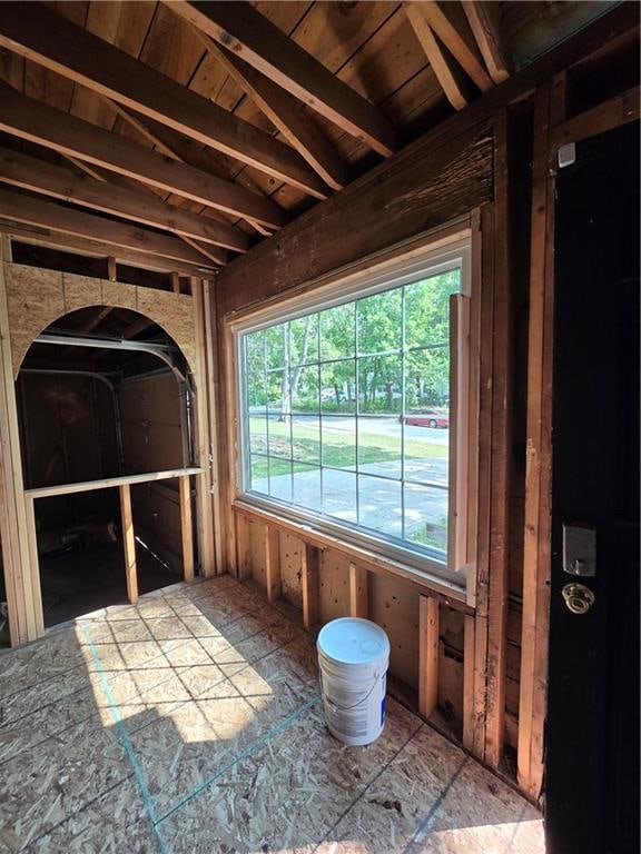 interior space featuring vaulted ceiling