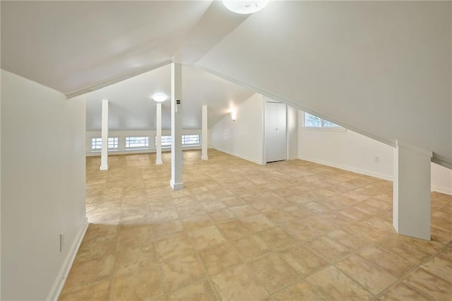 bonus room featuring vaulted ceiling