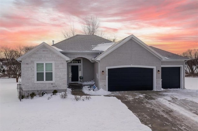 single story home featuring a garage