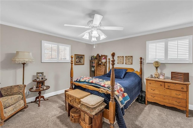 carpeted bedroom with ceiling fan and crown molding