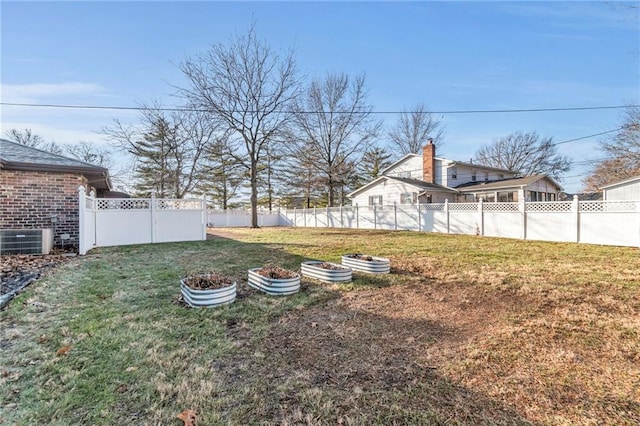 view of yard featuring central AC