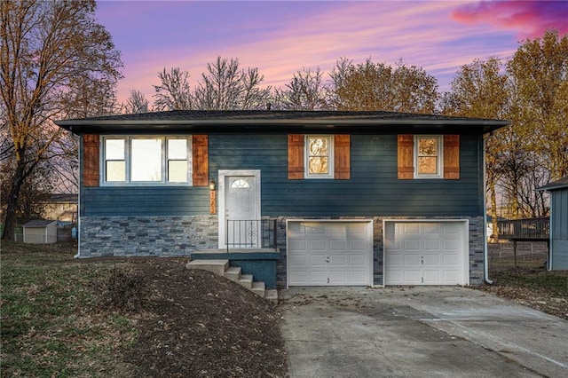 split foyer home featuring a garage