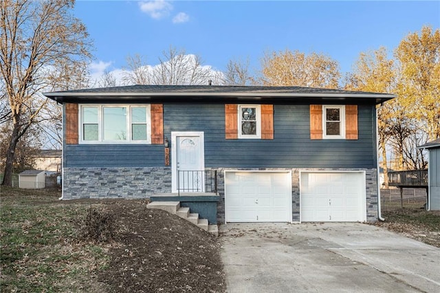 bi-level home featuring a garage