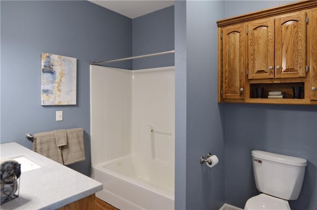 full bathroom featuring vanity, shower / bathing tub combination, and toilet